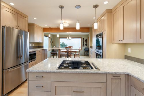 This home has amazing views, so the kitchen remodel focused on opening up the space to take advantage.