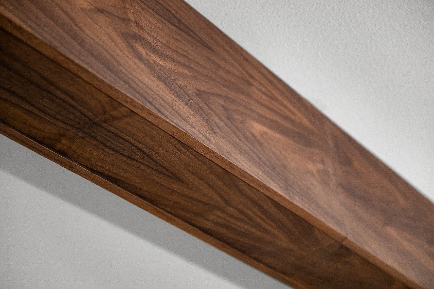 A walnut wrapped beam helped make structural changes to this home in Bellingham, Washington.