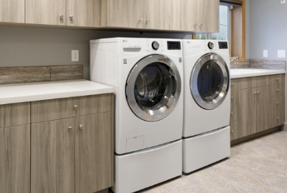 Laundry room in a partial basement.