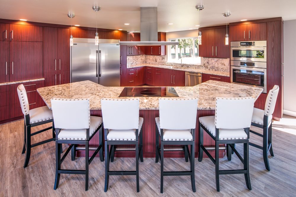This kitchen remodel included a bar that provides seating for the whole family.
